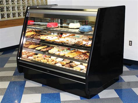 Self-service multi-deck bakery display case  Hillphoenix O5DRH-NRG High, Five-Shelf, Multi-Deck, Rear Load Merchandiser for dairy and beverage